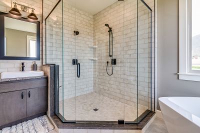 Frameless Glass Shower with Black Fixtures